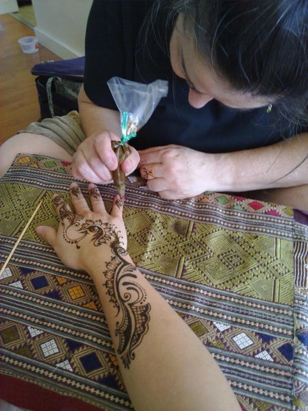 Kree working on my henna