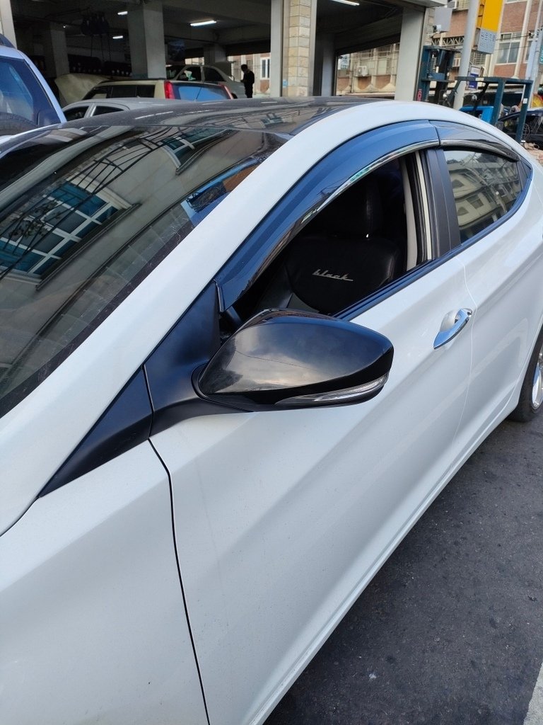 現代 ELANTRA 1.8 (2014年）電動後視鏡無法收折維修。