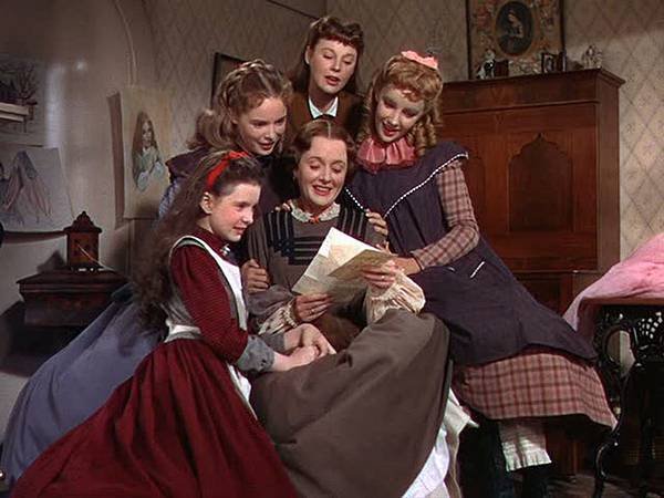 little women reading letter.jpg