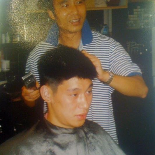 Framed photograph of Jeremy Lin and his barber Jimmy