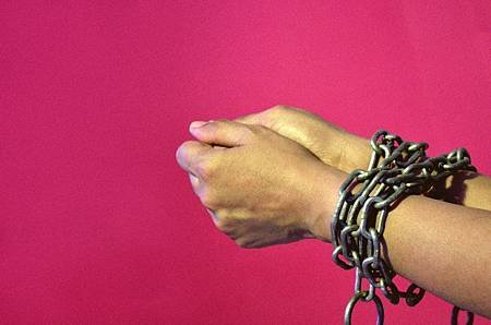 chained_hands_2_hires.jpg