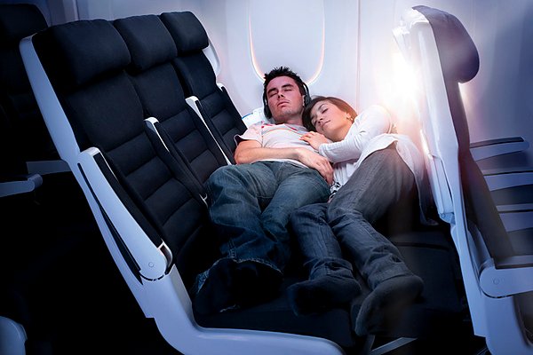 Economy Skycouch Young Couple Stretched Out.jpg