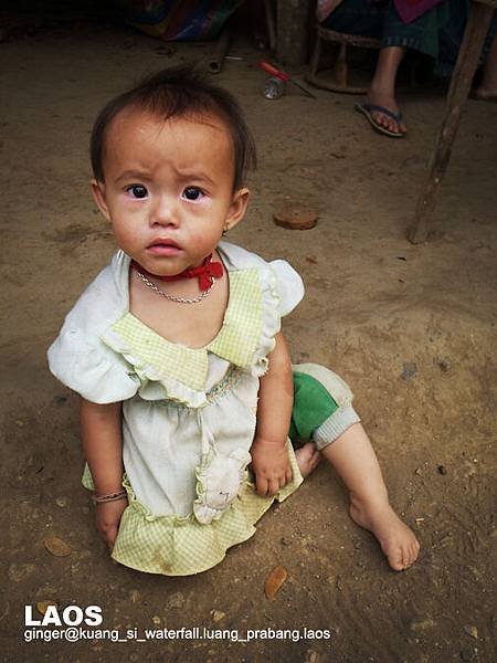 10.03.03little girl near Kuang Si Waterfall.jpg