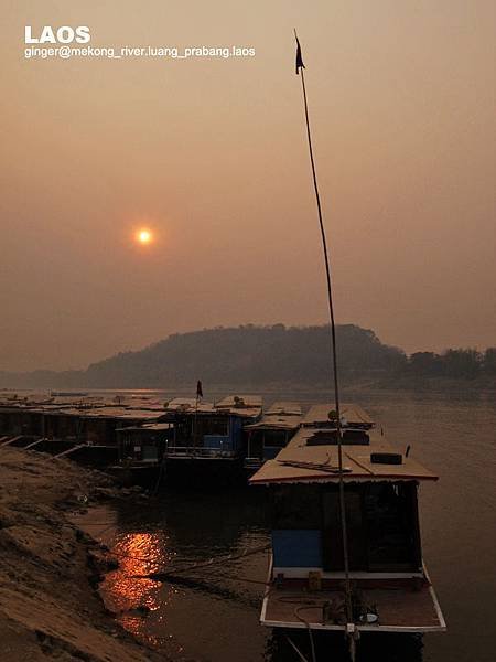 10.03.04slow boat, Mekong River, sunset.jpg