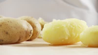 stock-footage-cooked-peeled-potatoes