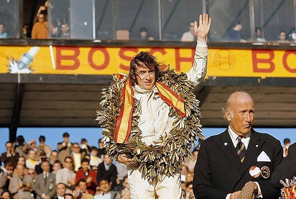 jackie_stewart__1970_spanish_gp_podium__by_f1_history-d5dwrt3