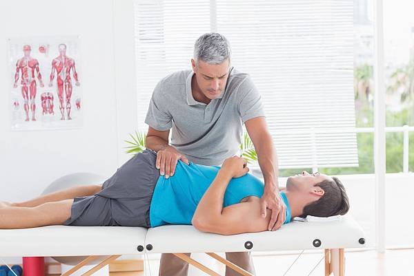 bigstock-physical-therapist-stretching-lower-back-man-85571219.jpg