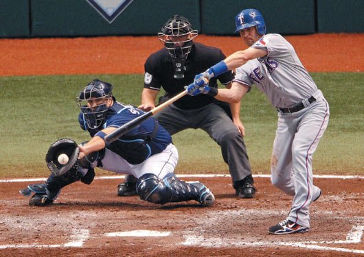 2010 Playoff Rays G2 Michael Young check swing.jpg