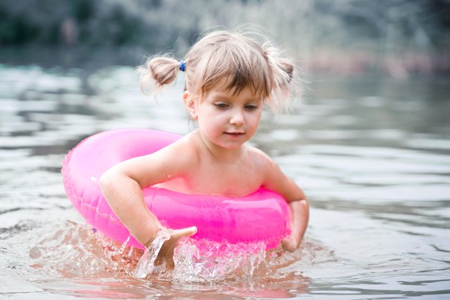 little-girl-in-pink-inner-tube