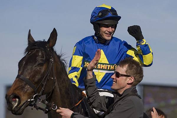 Jockey-Ryan-Mania-celebrates-after-winning-the-Grand-National-horse-race-on-Auroras-Encore-at-Aintree-1815535