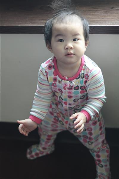 991210