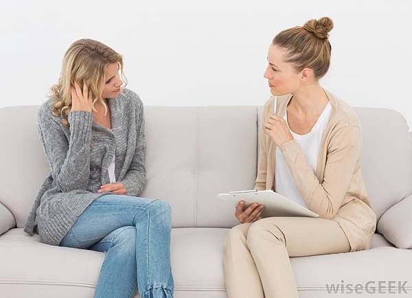 two-women-on-couch-talking.jpg