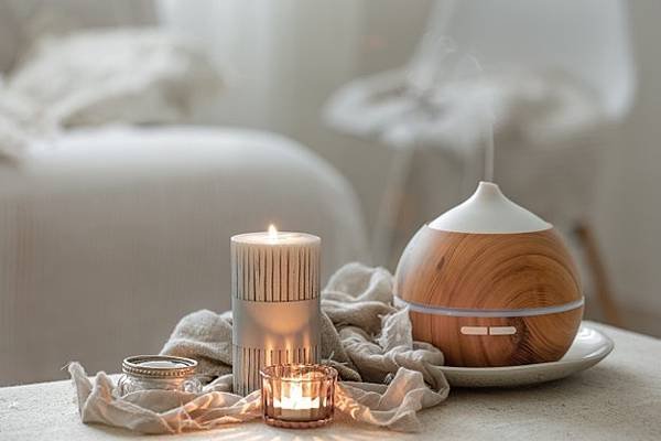 still-life-with-aroma-diffuser-moisturizing-air-burning-candles_169016-12901.jpg