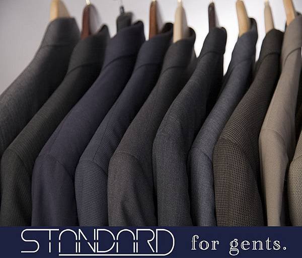 Mens-suits-hanging-on-a-rack.jpg