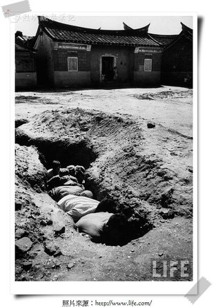 Chinese Nationalist soldiers on Quemoy Island, while digging trenches for protection against Red Chinese shelling.jpg