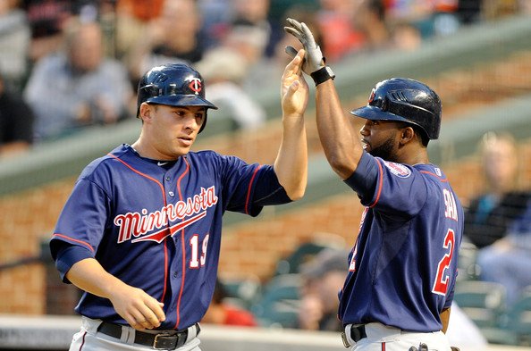 Danny Valencia&amp;Denard Span(zimbio)