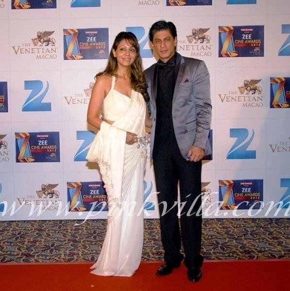 Shah Rukh Khan walks the red carpet with his wife Gauri Khan.jpg