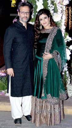 Raveen Tandon with her husband Rishi Thadani. 