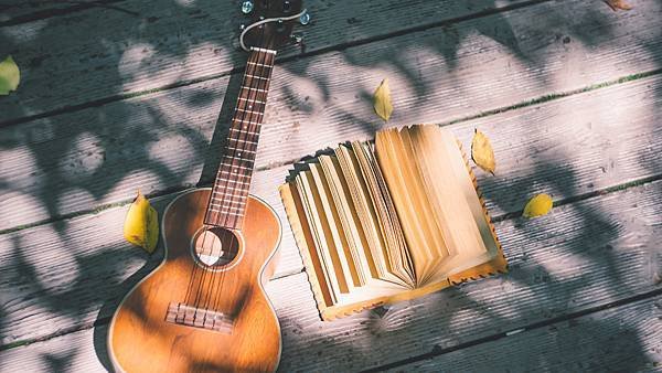 Lovepik_com-500465308-guitar-leaves-and-diary.jpg