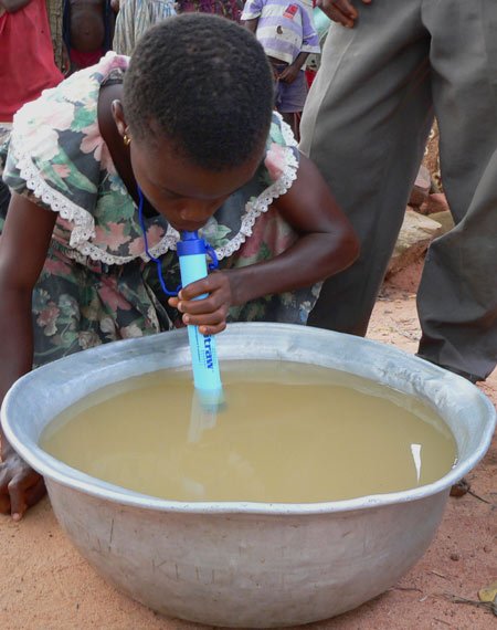 child-drinking-LifeStraw-with-metal-bowl.jpg