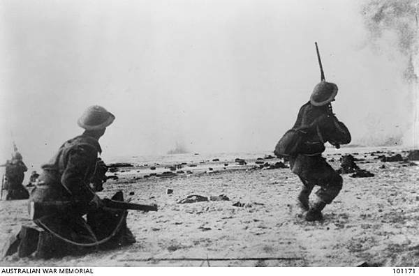 A British soldier on Dunkirk%5Cs beaches fires at strafing German aircraft.JPG