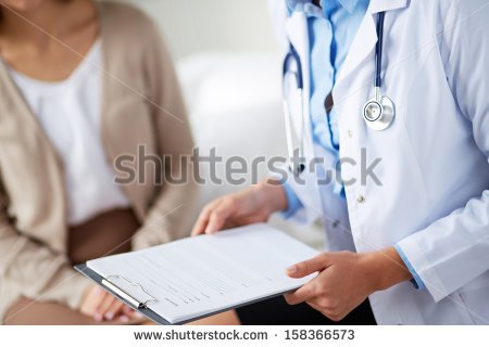 stock-photo-female-doctor-holding-application-form-while-consulting-patient-158366573.jpg