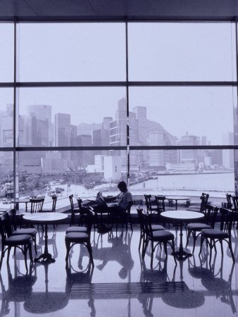 walter-bibikow-man-reading-paper-hong-kong-china.jpg