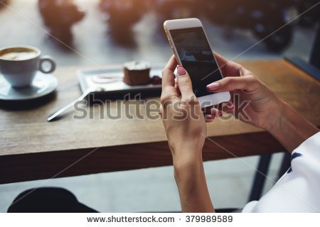 stock-photo-close-up-of-women-s-hands-holding-cell-telephone-with-blank-copy-space-scree-for-your-advertising-379989589.jpg