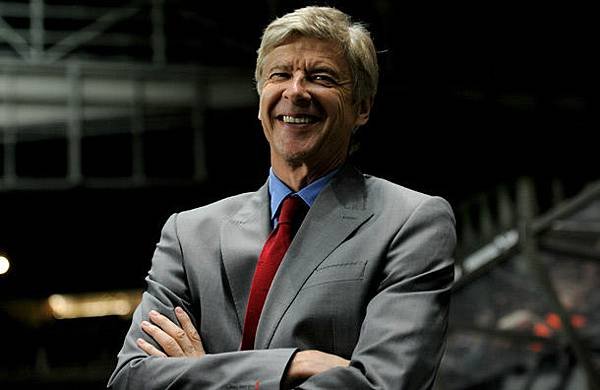 arsene-wenger-manages-a-smile-pic-getty-89992389.jpg