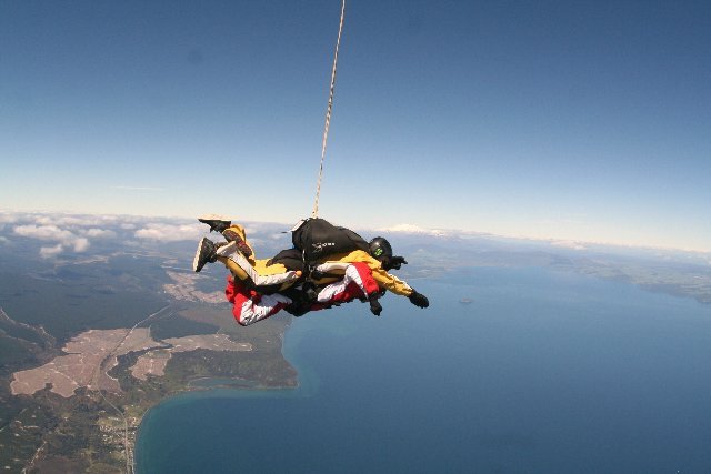 239650-15000ft-200km-h-1min-freefall-skydive-at-taupo-torsten-instructor-mttongariro-in-the-back-taupo-new-zealand