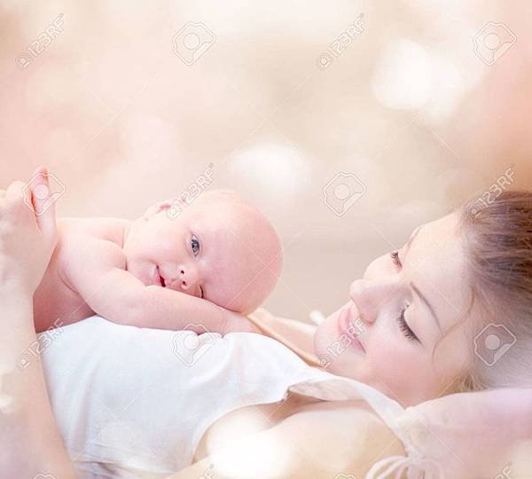 25227239-happy-mother-and-her-newborn-baby-kissing-and-hugging.jpg